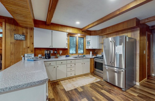 Lake Tomahawk House | Serene Lakefront Home with Fire pit, Dock, WIFI, & Dog-Friendly
