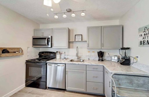 Ilexhurst Apartment | Serene oceanfront suite with Gulf view, grill, patio, central AC, & W/D