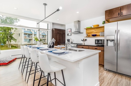 South Addition Condo | Serene waterfront condo with balcony, full kitchen & washer/dryer - dogs welcome