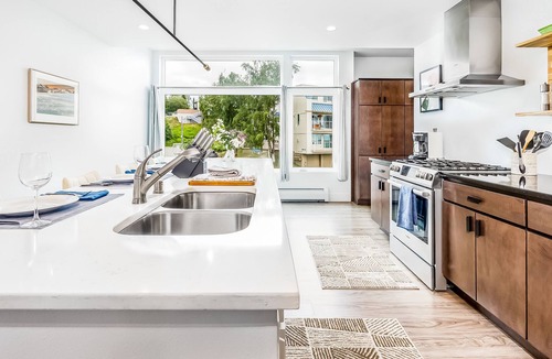 South Addition Condo | Serene waterfront condo with balcony, full kitchen & washer/dryer - dogs welcome