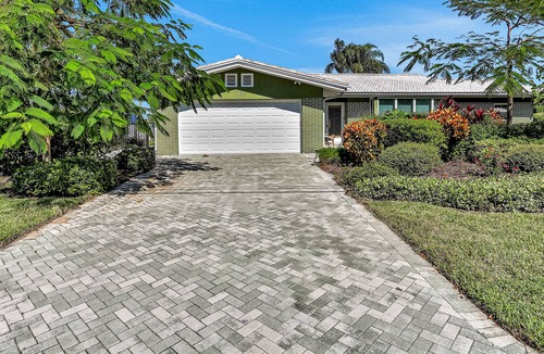 Harbor Bluffs House | Serene waterfront retreat with a washer/dryer, central AC, private pool, & dock