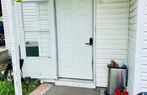 Coram Apartment | Serenity Haven: Cozy 2-Bedroom Home with Spacious Living & Big Backyard