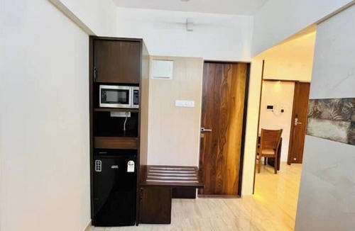 Kandivali East Apartment | Serviced Suite with Kitchenette near Mindspace