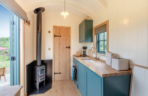 North Weald Cottage | Set among the fruit trees with views of the fields.