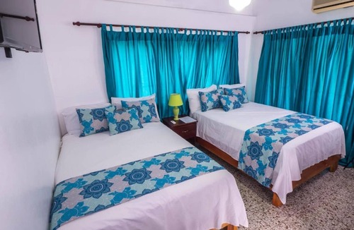 Ensanche Isabelita Hotel | Setup Hotels