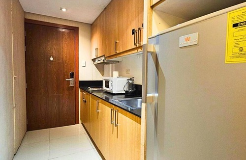 Barangay 76 Condo | Shell Residences MOA - The Executive Suites SL005 Cozy 1 Bedroom with AC, Wi-Fi