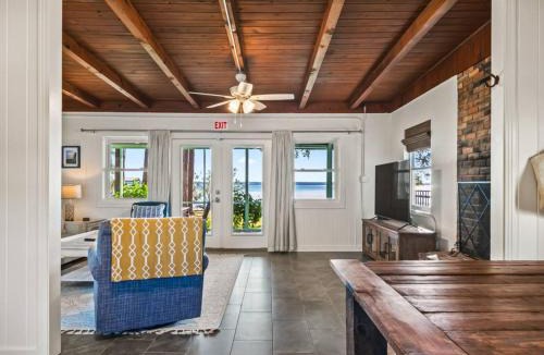 Panacea House | Shoreline Serenity- The Golden Goat on the Bay
