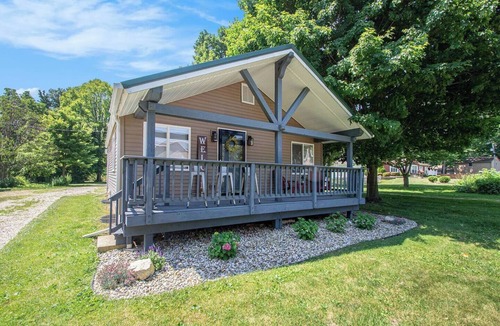 Paw Paw Lake House | Short Description: Lakewood Bungalow | Screened Porch 2 Baths Basement Hangout Walk to Lake Onsite Laundry