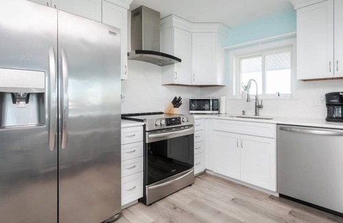 Hampton Condo | Short stroll to the beach! Newly renovated, 3 bedroom condo, wrap around porch