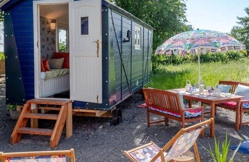 Halfway House House | Shrawardine Station Train Carriage sleeps 4 Fishing and Wild Swimming