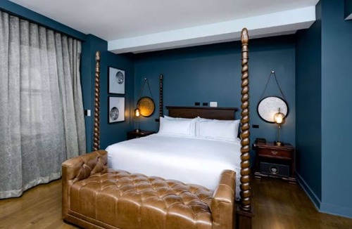 Court Avenue Entertainment District Hotel | Simple Elegance in a Refined Downtown King Room with Kitchen Near Civic Center