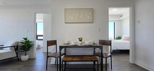 Downtown Mississauga Apartment | Sky High Luxe Stay 2BR-2BA Near Square One With Lake View, Gym, Pool & Parking
