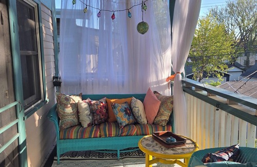 Merriam Park Apartment | Skyline Suite for 4+ with Private Balcony & Large Shared Fenced Yard