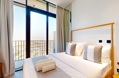 Jumeirah Village Triangle Apartment | Skyline Views: Sunset Studio with Balcony