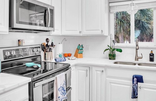 Navarre Beach House | Sleeps 10 with 8 beds! Decks, decks and more decks!