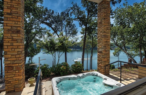 Barium Springs Villa | Sleeps 22 on Lake Norman, Island Retreat with Private Dock, Hot Tub, Game Rooms, Elevator, Full Bar, 2+ Acres of Lakefront Paradise, Fire Pit, Covered Dock, Kayaks, Perfect for Reunions, Corporate Retreats and Large Group Getaways