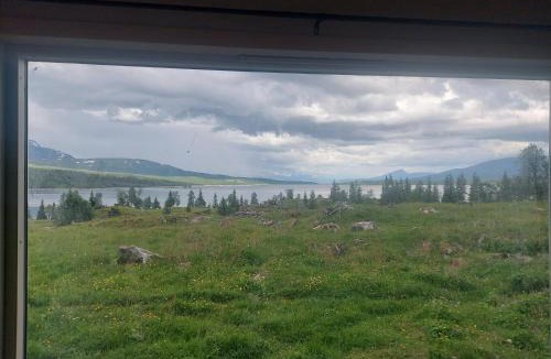 Hattfjelldal House | small camping cabbin with shared bathroom and kitchen near by