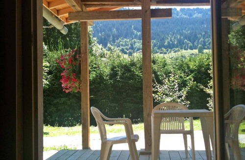 Praz-sur-Arly Apartment | Small charming T3 for 4 people - Terrace sheltered in RdJ of chalet - South slope, 100m from a ski bus stop