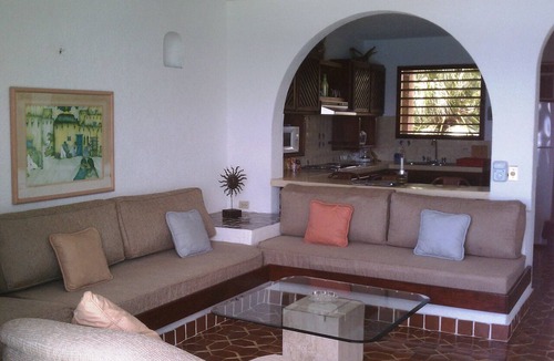 San Miguel Condo | Small is Beautiful. Relax ON the beach, convenient & near the Presidential Villa