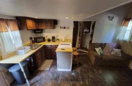 Kalkaska Cabin | Small quaint cabin with outside hot tub! sleeps 6!