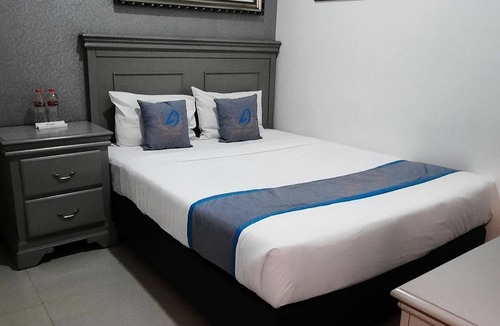 Dinoyo Hotel | Smart Tlogomas