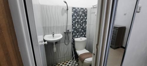 Dinoyo Hotel | Smart Tlogomas Syariah