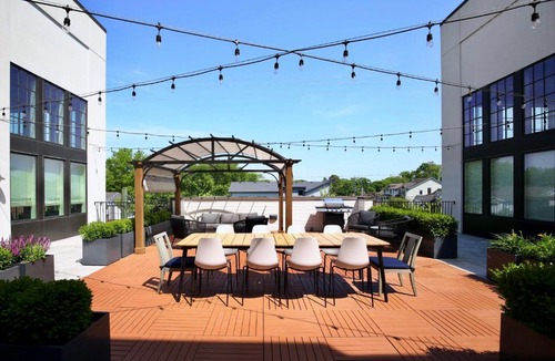 Nashville Apartment | Soaring Ceilings & King Beds Overlooking Courtyard, 1 of 7 Themed Lofts at Cowrite, Find Coffee and Tacos Downstairs, Complimentary Spin Class, Walk to Shopping in 12 South, 10 Minutes to Broadway, Parking, 24 Hr Hospitality