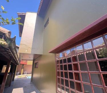 Balneario Tres Marias Villa | Sobrado a 30m praia com 4 suites, vista mar, Wi fi, Piscina
