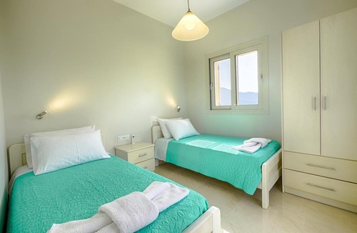 Termenades Apartment | Sofia Apartment 1 - Panoramic sea view over the entire bay of Agios Georgios Pagi