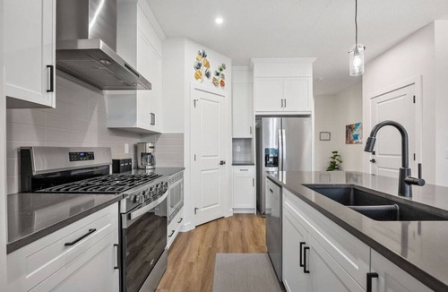 Calgary House | Sol | Close to Airport, Trails & Parks | Pets Ok