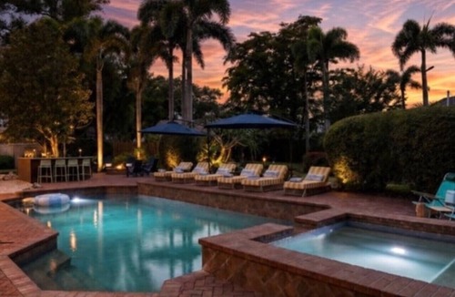 Palma Sola House | SolMaré - 5Br, pool, spa, game room, mini golf!