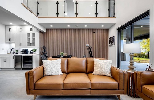 Leamington House | Sophisticated Shoreline Retreat with Sunset Patio & Poolside Lounging in Ontario, Canada