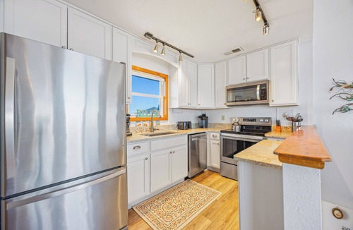 Avon House | Soundfront Home w/Private Boat Dock, Game Room, Windsports Access, & More!