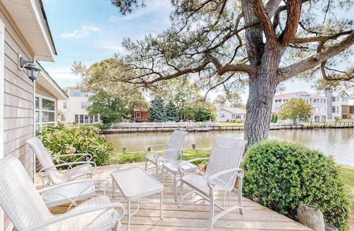 South Bethany Harbor House | South Bethany bay-view home with dock, deck, kayaks, & bikes