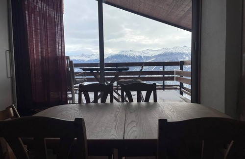 Anzere Apartment | South-facing mountain studio with fireplace, fully-equipped kitchen and breathtaking views.