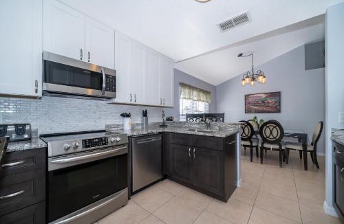 Seasons House | South Facing Pool with Stunning Lake View - Family Friendly Home - Nr Disney