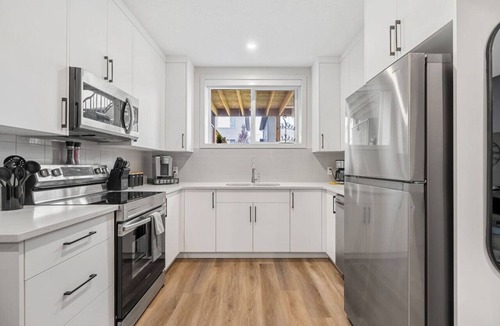 Cochrane Apartment | Southern Horizons | Mini Nordic Spa | Fenced Yard