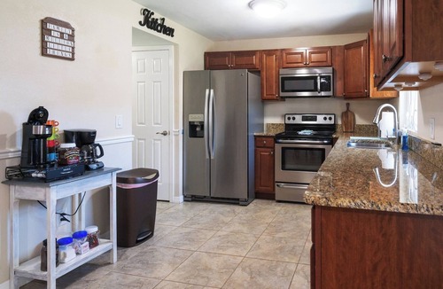 Port Saint John House | Space Coast Retreat: Games, Hot Tub, Fenced yard, Pool Table + Massage Chair