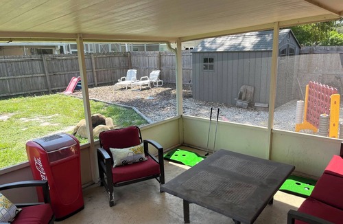 Port Saint John House | Space Coast Retreat: Games, Hot Tub, Fenced yard, Pool Table + Massage Chair