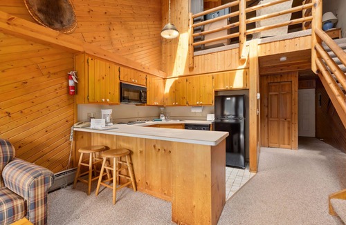 Breezy Point Condo | Spacious 1BR + Loft Condo with Balcony & Fireplace
