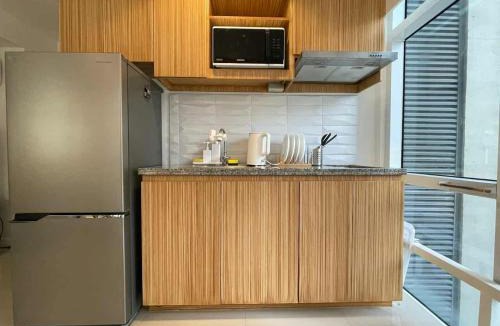 Bonifacio Global City Apartment | Spacious 1BR Loft with Flex Room in BGC