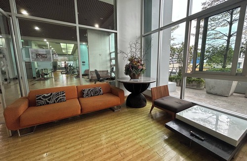 Ratchadaphisek Condo | Spacious 2-bedroom condo in welcoming Bangkok with WiFi, AC, fitness room