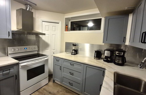 Northwest Calgary House | Spacious 2-Bedroom Suite w/Sauna, Pool & Mountain Views
