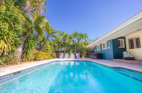 South Corals House | Spacious 3-Bedroom Villa with Heated Saltwater Pool and Fenced Yard in Oakland Park