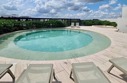 Tulum Condo | Spacious 3-bedroom condominium in Tuk Tulum, ideal for families or small groups seeking comfort, privacy, and strong amenities. Enjoy a private balcony plus access to rooftop pools, paddle court, and underground parking in a great Tulum location.