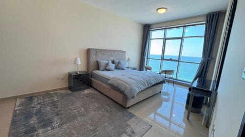 Rumailah Apartment | Spacious 3BR Seaview Duplex Perfect for Families