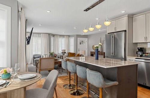 Winter Hill House | Spacious 4-bedroom 4-bath house with parking, game room, outside lounge and AC