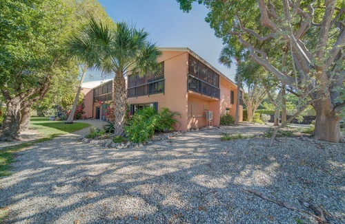 Rock Harbor Villa | Spacious 4-bedroom Key Largo Villa steps from the pool, pickleball, & marina.