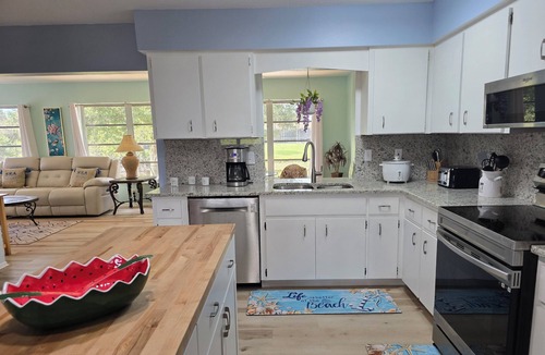Oakland Hills House | Spacious 4-bedroom house in charming Rotonda West with WiFi, AC, canal front.