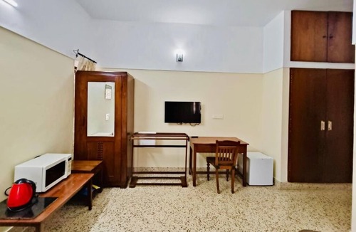 Palayam Apartment | Spacious 4BHK AC Apartment, BedroomHallDiningKitchen, in the Heart of Trivandrum